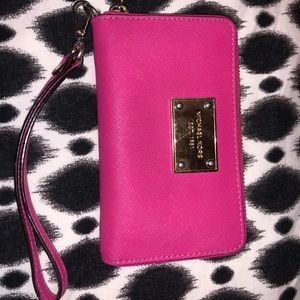 Michael Kors Bags - Pink Michael Kors wristlet wallet. Michael Kors Bags - Pink Michael Kors wristlet wallet.